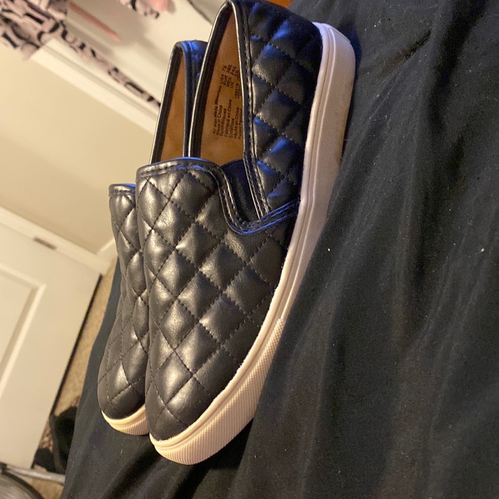 black quilted slip ons